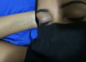 Filthy Arab girl wearing Hijab gives deepthroat blowjob. POV
