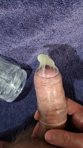 Guy using see through masturbator