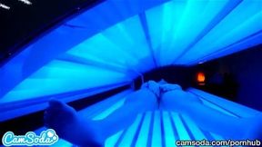 teen latina gets caught rubbing her clit while using a tanning bed