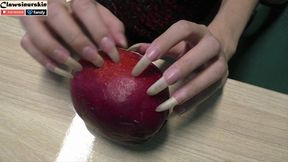 I destroy fruit by piercing, digging and scratching with my long natural nails