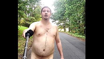 Exhibitionist Nudist walks butt naked in woods/forest and on public road, open field