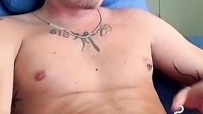 ”Handsome blonde explores his booty while blowing smoke”