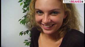 Blonde girl strips and spreads legs on the bed