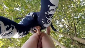 Femdom pegging. Strap-on in slave&#039;s ass outdoors in the bushes.