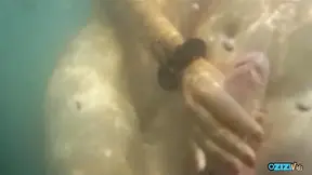 Young babe deepthroats and sucks his big dick on the beach