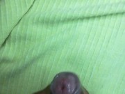 Painted nails on a green sheet