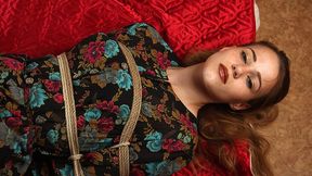 Anne: barefoot girl in flower dress, hogtied on the floor with hemp rope, wiggles and poses (HD MOV)