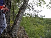 Two tight streams of urine cross in the mountains. Pissing outdoor UHD 4K video