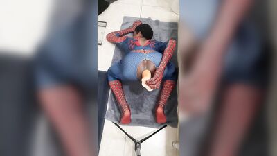 Spiderman cums while riding massive dildo