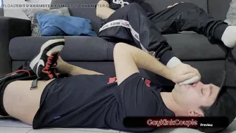 Guy worships sneaker socks and soles then cums on feet