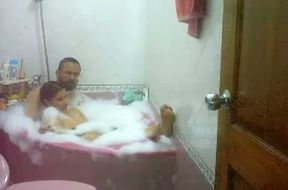 Chunky Indian housewife with her hubby in the bathtub