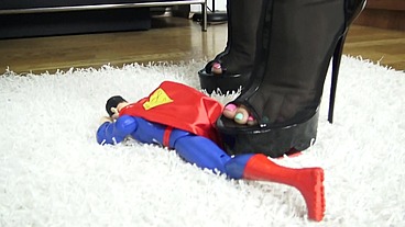 Superman Crush! Cruel Reell crushes Superman symbolically for all men!