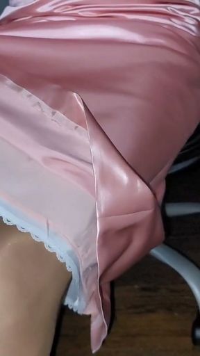 Pink satin skirt with a silky half slip   Clip 1