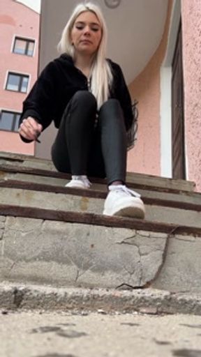 Blondie girl is smoking and lot of spitting aggressively POV distance spit