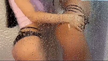 Lesbian MILFs strip off wet clothes and make out