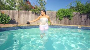 Tina takes a Dip in the Pool wearing all White