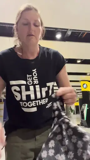 Airline stewardess flashes her perky boobs at airport
