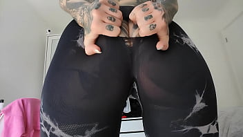 Twerking in ripped gym tights