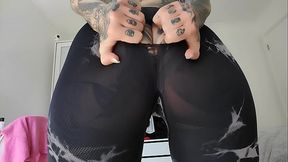Twerking in ripped gym tights
