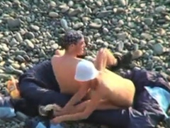 Voyeur on public beach. Oral sex