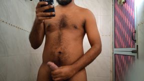 Stroking my cock hard in bathroom