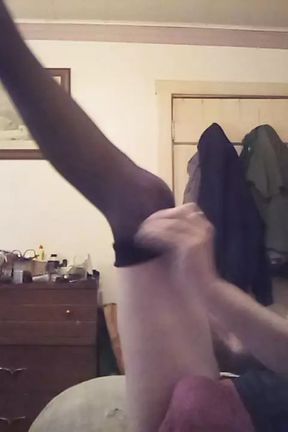 Mellissa puts stockings on her sexy legs