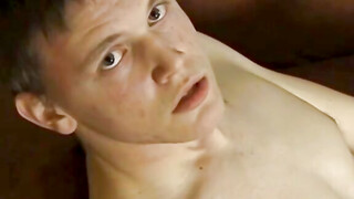 Long haired twink Logan Miles masturbates his thick cock