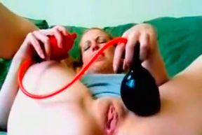 Chunky teen bitch pumping her pussy and asshole with a dildo