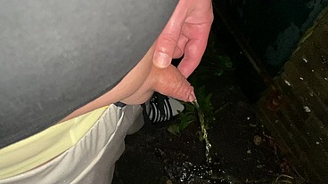 Neo pissing outside in the rain