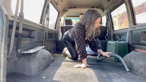 vacuuming old dirty van in leather pants 0505