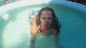 Long sleek hair, underwater bubble blowing