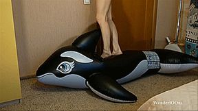 Emma stomping and deflate the big whale