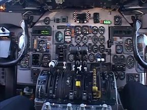 Randy pilot fondles sexy brunette in the cockpit