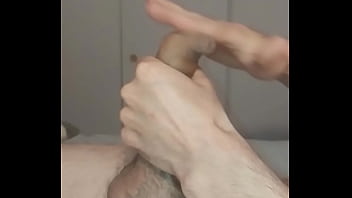 Masturbation technique for uncut cock