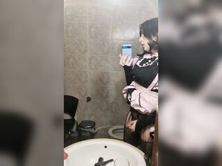 maid on front of mirror washing teets and pissing
