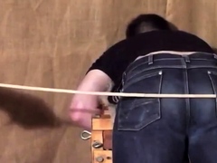 Caned over tight jeans Daddy boy