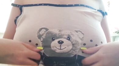 Busty student fingerfucks her huge natural tits while studying