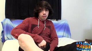 Thin boy strokes his penis and facials himself with spunk