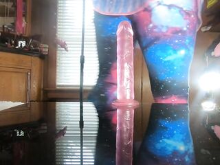 Trans bitch Daphne bangs herself on the table with her pink sex-toy