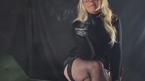 Seducing you in fishnets and leather mini
