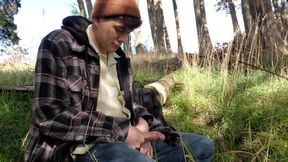 Boy stops jacking off to piss in the woods