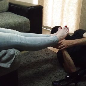 Foot worship for a woman in jeans