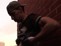 Young thug strokes his deliciously fat cock outdoors on a rooftop