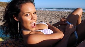 Babe Gives Blowjob on the Beach