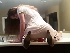 busty babe loves to ride dildo in the bathroom