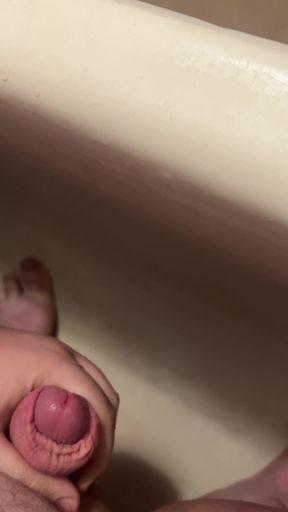 Jerking off a Small Cock in the Bathroom and Cumming