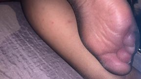 Feet in black pantyhose to jerk off and cum
