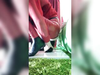 Ts Isabella red latex close-up of ribbed dildos