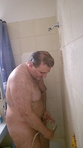 Chubby Daddy Bear taking a shower