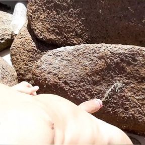 Famous football player is caught pissing on the beach